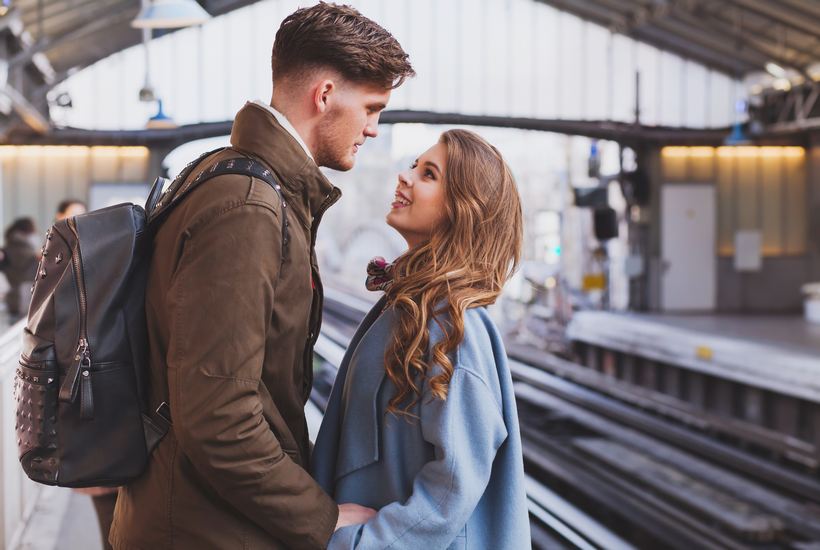 Long Distance Relationship Couple At Train Station