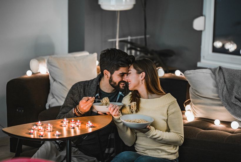 Young Couple Celebrating Valentines Day Indoors