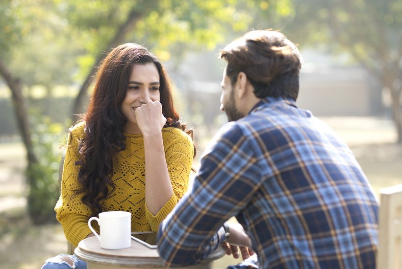 Romantic Indian Couple Having Coffee At Park 