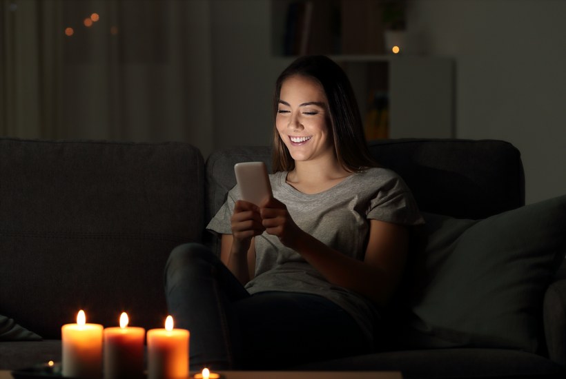 Girl Writing Messages On A Phone In The Night